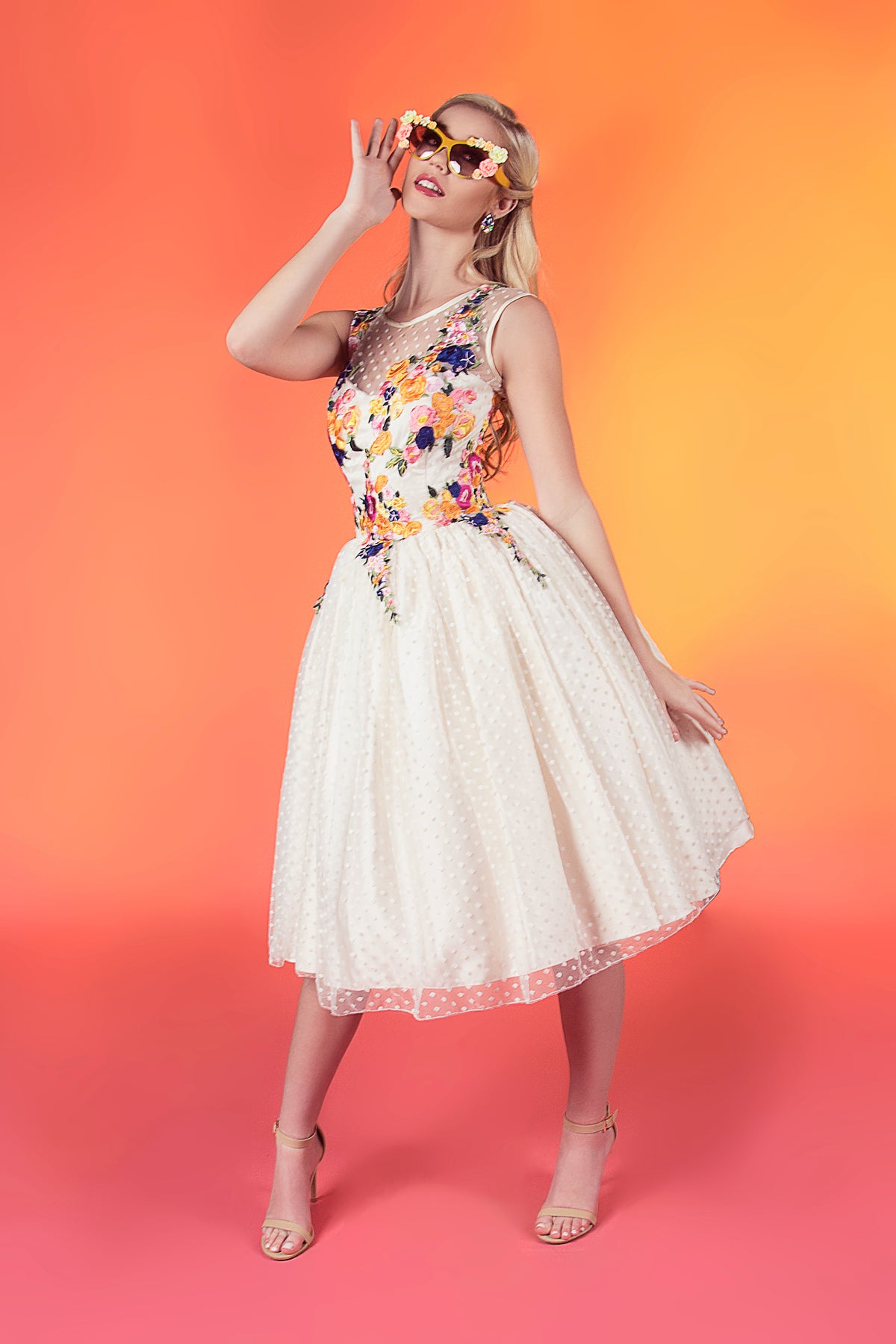 Floral embroidered wedding dress with polka dot tulle skirt, perfect for custom bridal looks