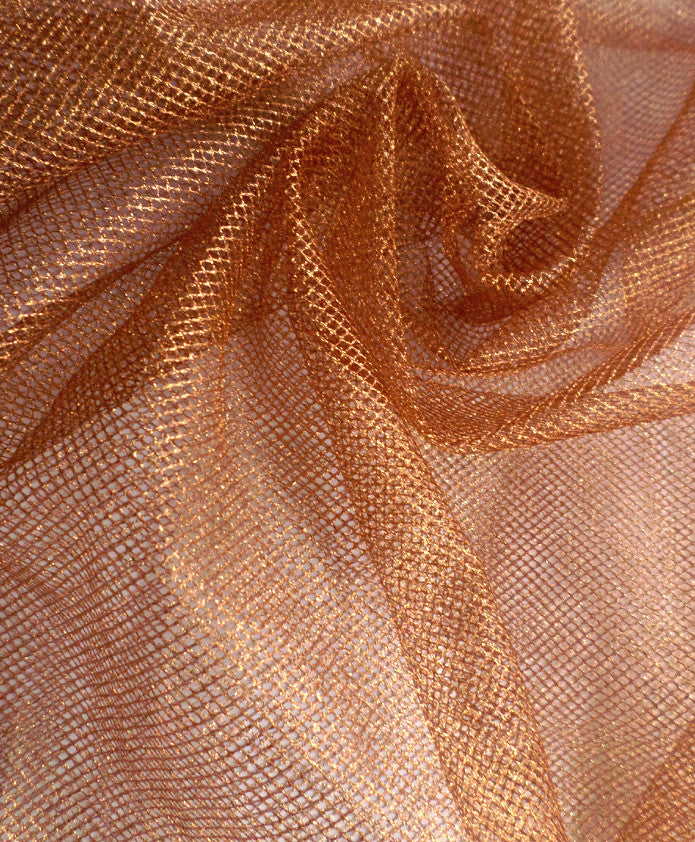 Shimmering rose gold mesh fabric with delicate texture, ideal for custom bridal gowns and dyeable wedding dress designs.