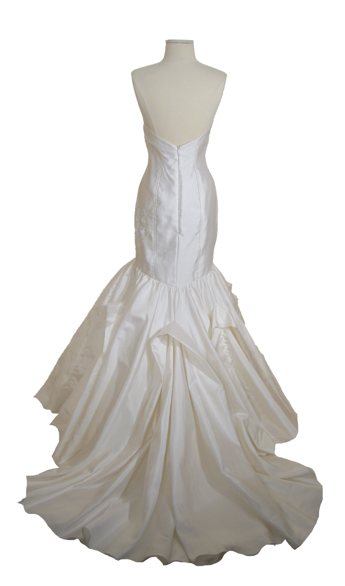 Elegant white mermaid wedding dress with ruffled skirt and sleek back design
