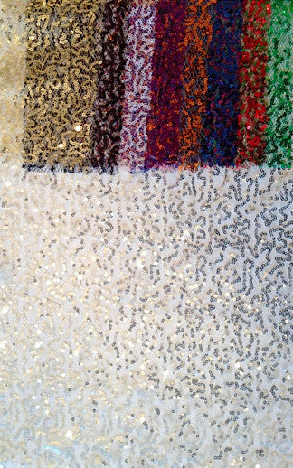 Sparkling sequin wedding dress fabric with colorful ombre dye swatches above