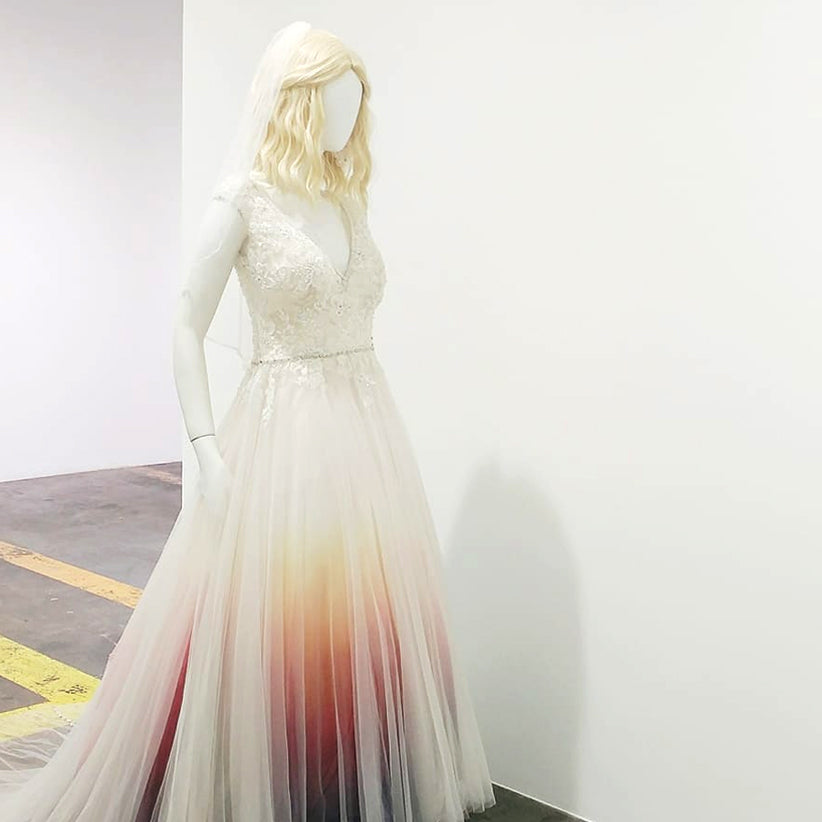 Custom ombre wedding dress with lace bodice and gradient skirt, perfect for inclusive bridal celebrations.